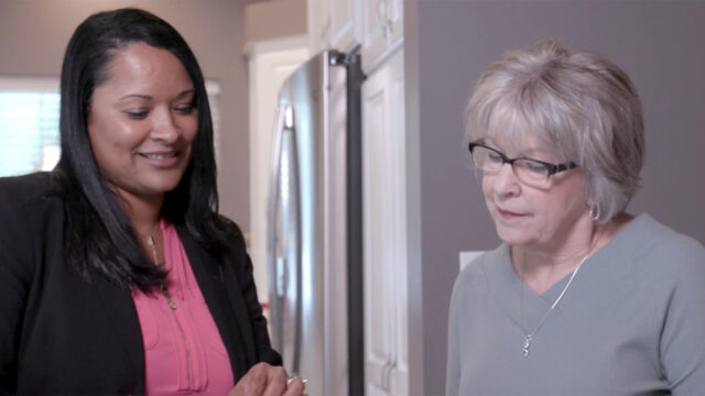 Andrea, a PAL, speaking with Pat, a patient living with LEMS