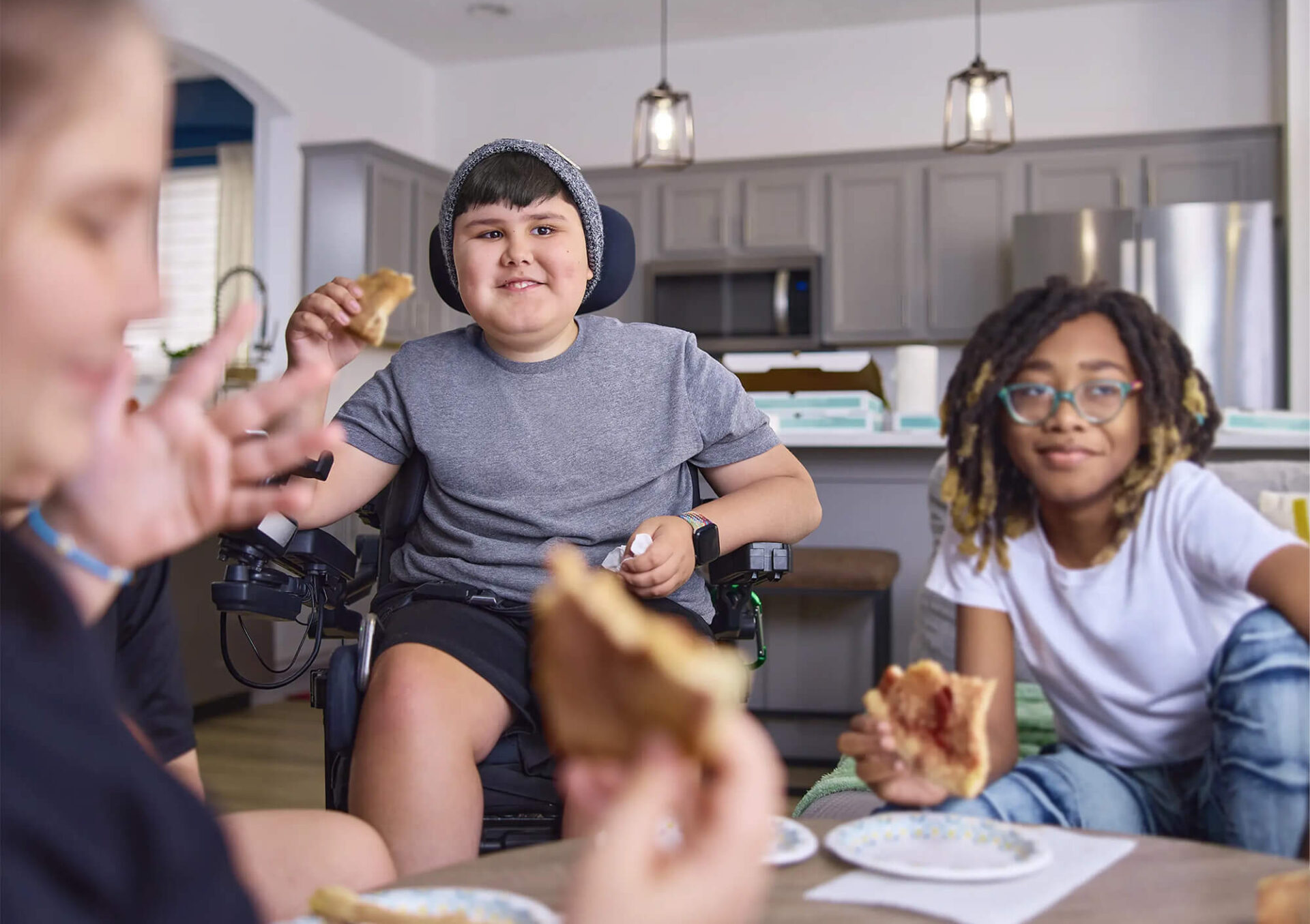 Child with DMD spending time with family and friends